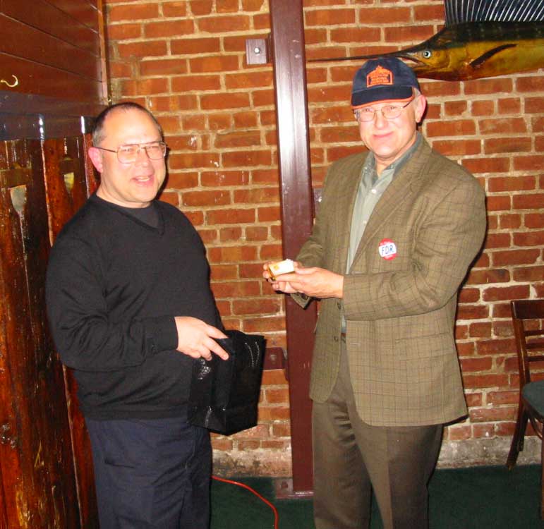 Chapter President Tony Meadow presents Dr. Gray Brechin an SIA Hat and Pin